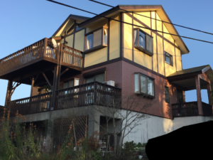 窯業系サイディングのフッ素クリアー外壁塗装と屋根塗装・ウッドデッキ補修（田方郡函南町・別荘地）